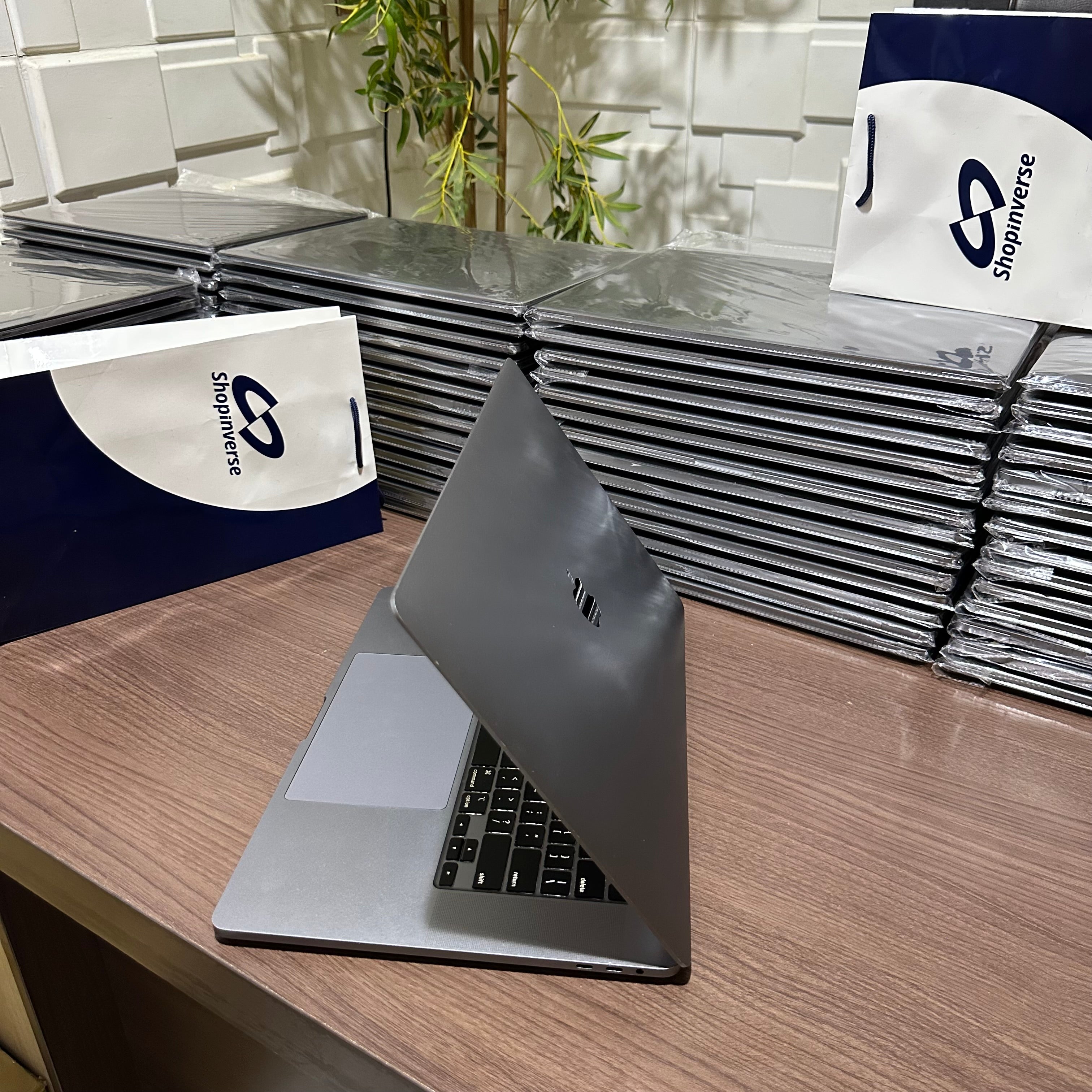 Apple MacBook Pro 2018 - Intel Core i9 - 500GB SSD - 32GB RAM - 4GB Dedicated Graphics - Touch ID - Touch Bar - Keyboard Light - (Minor body dent)