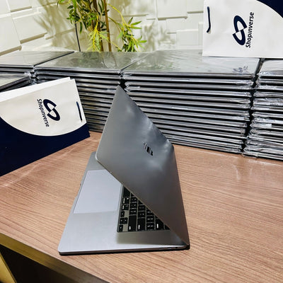 16 - inch Apple MacBook Pro 2019 - Intel Core i9 - 500GB SSD - 32GB RAM - 4GB Dedicated Graphics - Touch ID - Touch Bar - Keyboard Light - (Minor body dent)