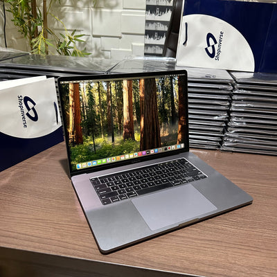 Apple MacBook Pro 2018 - Intel Core i9 - 500GB SSD - 16GB RAM - 4GB Dedicated Graphics - Touch ID - Touch Bar - Keyboard Light - (Minor body dent)