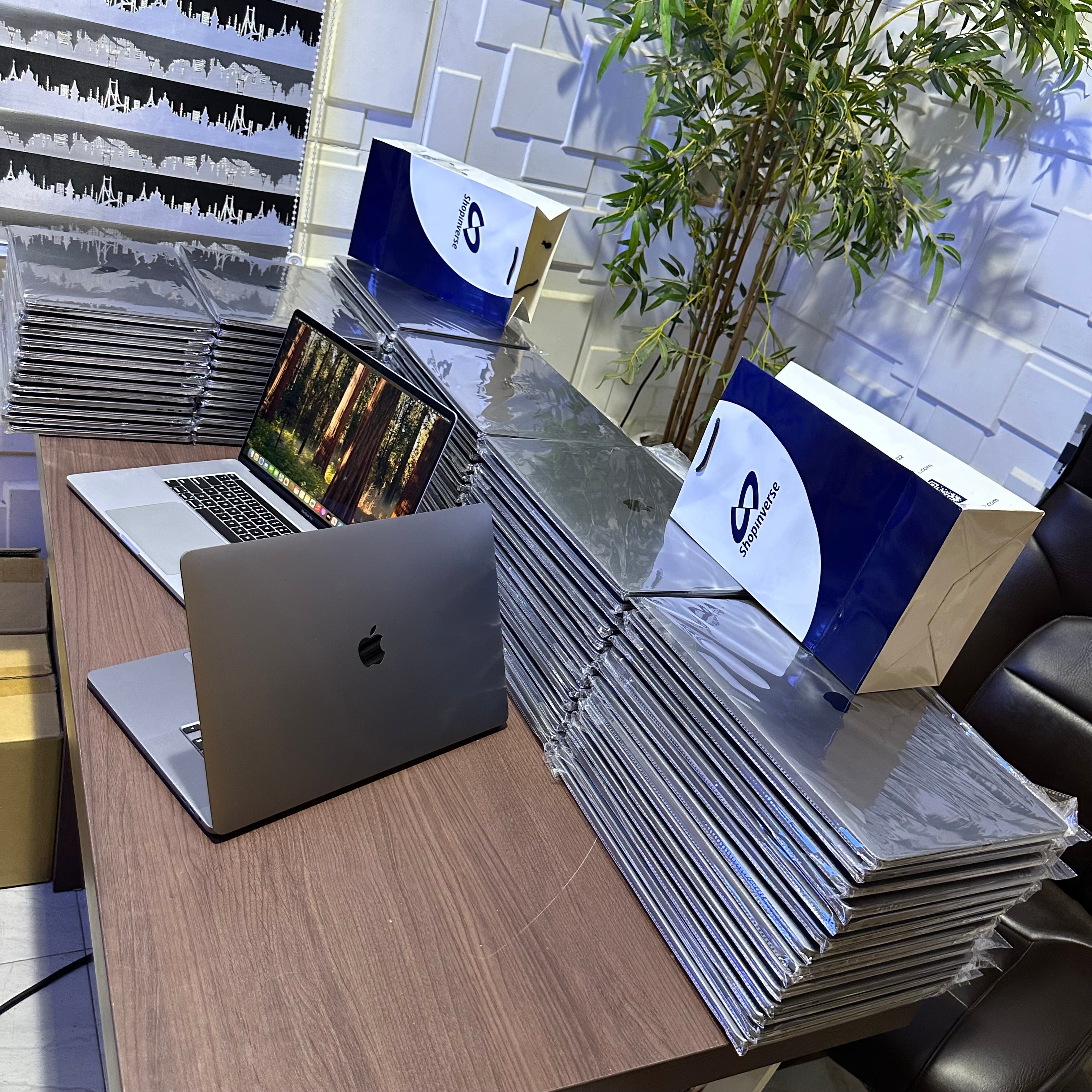 Apple MacBook Pro 2018 - Intel Core i9 - 500GB SSD - 16GB RAM - 4GB Dedicated Graphics - Touch ID - Touch Bar - Keyboard Light - (Minor body dent)