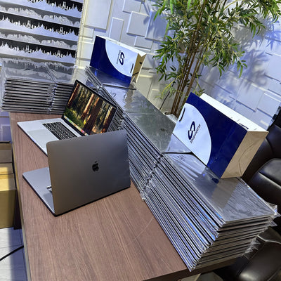 Apple MacBook Pro 2018 - Intel Core i9 - 500GB SSD - 16GB RAM - 4GB Dedicated Graphics - Touch ID - Touch Bar - Keyboard Light - (Minor body dent)