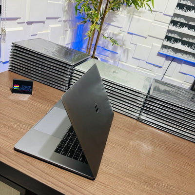 Apple MacBook Pro 2018 - Intel Core i7 - 500GB SSD - 16GB RAM - 4GB Dedicated Graphics - Touch ID - Touch Bar - Keyboard Light - (Minor body scratch)